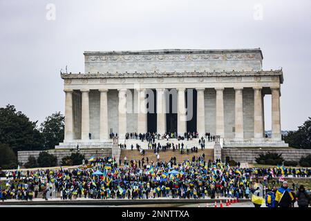 Washington DC, USA. February 25, 2023, Washington D.C, District of Columbia, USA: Ukrainian Ambassador to the US, OKSANA MARKAROVA, speaks at a rally reflecting the past year of the War in Ukraine and the future.People came together in a soft protest coined 1 Year of War Mass Rally at the Lincoln Memorial in Washington, DC Despite the sleet and cold weather people came out to show support and also to listen to the guest speakers lined up to share their backing of the war and boost morale. Credit: ZUMA Press, Inc./Alamy Live News Stock Photo