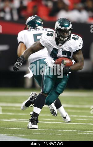 06 December 2009: Philadelphia Eagles quarterback Michael Vick (7) hugs  quarterback Donovan McNabb (5) after a touchdown in the Philadelphia Eagles  34-7 victory over the Atlanta Falcons at the Georgia Dome in