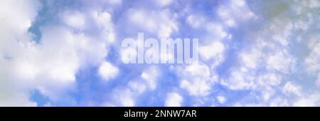 White clouds against blue sky Stock Photo