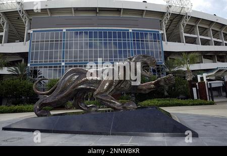 A statue of a jaguar stands outside the entrance to EverBank Field