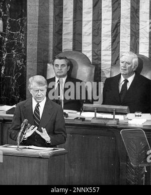 United States President Jimmy Carter, lower left, addresses a joint session of the US Congress in the US Capitol in Washington, DC 0n September 18, 1978.  In his remarks, the President briefed the members and the American people on the talks between Egypt and Israel that resulted in the Camp David Accords.  He went on to laud President Anwar Sadat of Egypt and Prime Minister Menachem Begin of Israel for their courage in reaching the historic accords.  Looking on are US Vice President Walter Mondale, center, and Speaker of the United States House of Representatives Thomas P. “Tip” O’Neill (Demo Stock Photo