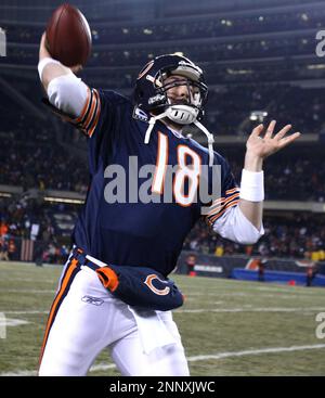 Quarterback Kyle Orton of the Chicago Bears hands-off the ball