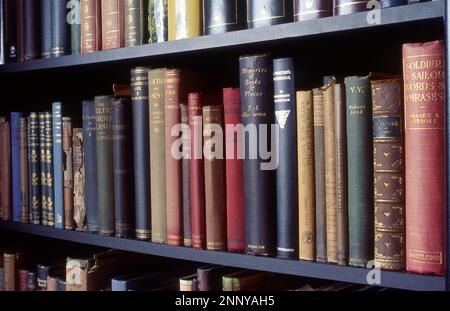 BOOKCASE OF OLD BOOKS Stock Photo