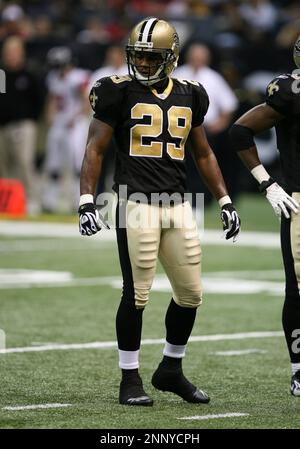 Atlanta Falcons linebacker Keith Brooking manages to tackle New Orleans  Saints running back Reggie Bush during first quarter action. The Saints  defeated the Falcons 22-16 at the Louisiana Superdome in New Orleans