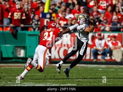 16 November 2008: Saints receiver Lance Moore tries for extra yards with a  Chiefs defender hanging on after making a reception makes a reception. Moore  had 8 receptions for 102 yards and