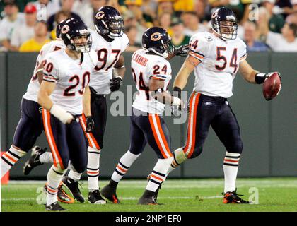 Chicago Bears line backer Brian Urlacher (54) laments the loss to