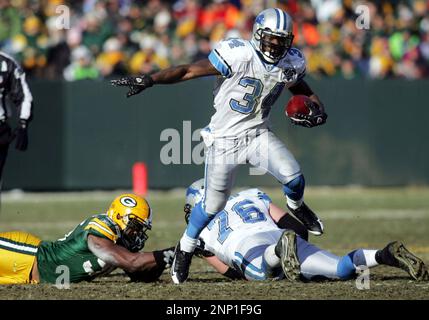 Indianapolis Colts wide receiver Marvin Harrison (88) outruns Detroit Lions  cornerback Leigh Bodden (28) during the fourth quarter at Lucas Oil Field  in Indianapolis on December 14, 2008. The 16-yard catch was