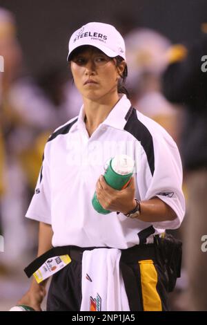 Pittsburgh Steelers trainer Ariko Iso watches a game replay on the big  screen. Iso is the first and only full time female trainer in the NFL today.  The Pittsburgh Steelers defeated the