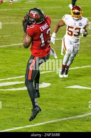 Landover, United States. 09th Jan, 2021. Tampa Bay Buccaneers wide receiver  Antonio Brown (81) celebrates with teammate Chris Godwin (R) after a  36-yard touchdown against the Washington Football Team during the first