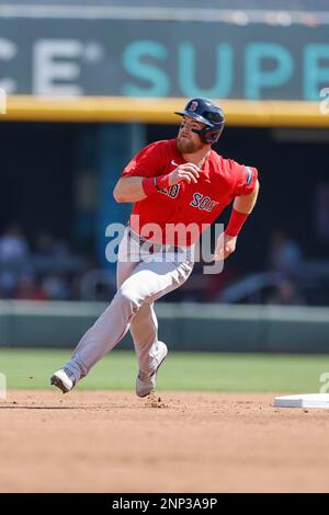 North Port FL USA: Boston Red Sox second baseman Christian Arroyo (39) rounds second and heads to third on the double by outfielder Ramie Tapia (17) d Stock Photo