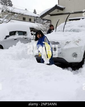 a-girl-removes-snow-in-saga-