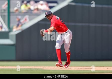 North Port FL USA: Boston Red Sox shortstop David Hamilton (80) fields the ball and throws to first for the out during an MLB spring training game aga Stock Photo