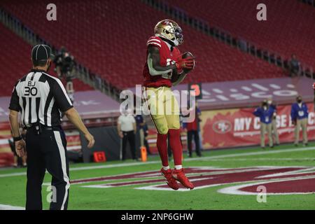 San Francisco 49ers vs. Buffalo Bills. Fans support on NFL Game. Silhouette  of supporters, big screen with two rivals in background Stock Photo - Alamy