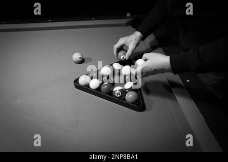 Billiard balls are sorted on the billiard table Stock Photo