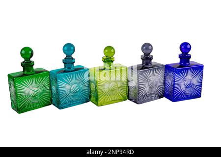 Colorful crystal glass Whiskey bottle. Glass bottles isolated on white background, Colorful glass set on white background, Glass for fresh water, Vint Stock Photo