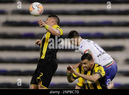 Lautaro Gianetti of Argentina's Velez Sarsfield, top, heads the