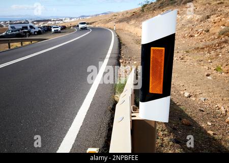reflective sign on road barrier lz-35 rural mountain road near las grietas tias region Lanzarote, Canary Islands, Spain Stock Photo
