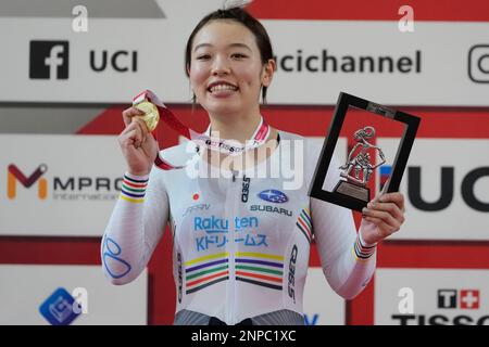 Japan's Mina Sato celebrates on the podium after winning the women's