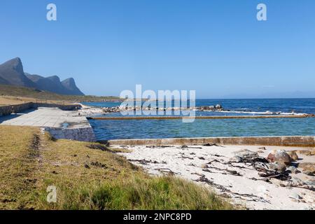 The tidal pool and picnic site at Buffels Bay Beach, Cape Point Nature Reserve, Cape Peninsula, Western Cape, South Africa Stock Photo