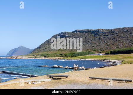 The tidal pool and picnic site at Buffels Bay Beach, Cape Point Nature Reserve, Cape Peninsula, Western Cape, South Africa Stock Photo