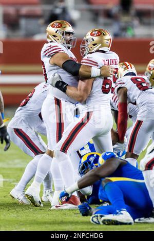 Chicago Bears head coach John Fox celebrates a field goal with Chicago Bears  center Hroniss Grasu (55) during the first half of an NFL football game  against the San Francisco 49ers, Sunday