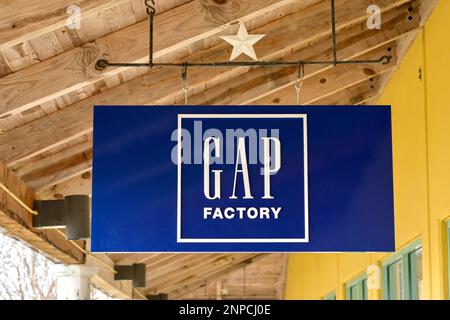 San Marcos, Texas - February 2023: Sign outside a factory outlet store for the Gap chain of stores. Stock Photo