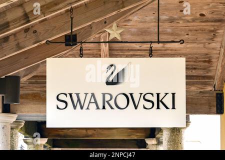 San Marcos, Texas - February 2023: Sign outside a factory outlet store for Swarovski Stock Photo