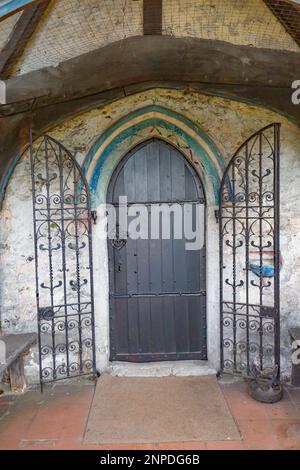 Britains Ecclesiastical Heritage  - North Porchway gated entrance to St Marys Church, Runwell in Essex, Britiain. Stock Photo