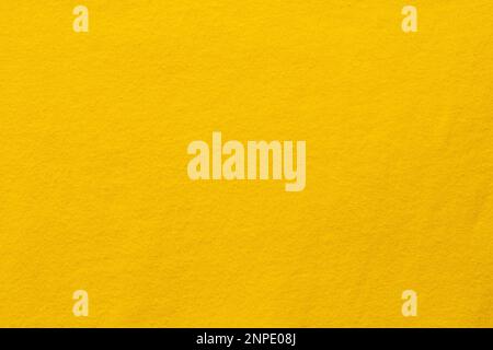 Yellow fabric texture background pattern of natural textile surface. Stock Photo