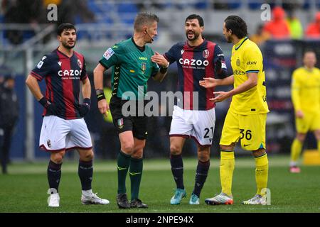 Bologna's Roberto Soriano protests with The Referee of the match Daniele Orsato of the Schio Section  during  Bologna FC vs Inter - FC Internazionale, italian soccer Serie A match in Bologna, Italy, February 26 2023 Stock Photo