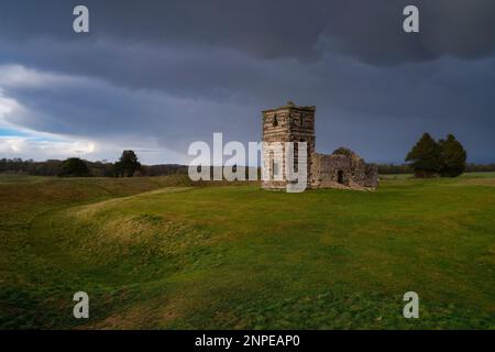 Storm clouds over the ruins of Knowlton Church in Dorset. Stock Photo