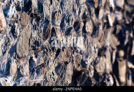 Stone Texture. An ancient wall of stones. Background. Template. Photo in high quality. Horizontal. Stock Photo