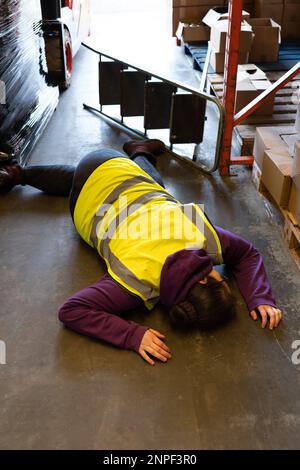 Woman falling from step ladder during painting walls at home Stock ...