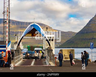 Syðradalur, Denmark - Sep, 2020: Ferry to Klaksvík in the port in the village of Syðradalur on the island of Kalsoy Faroe Islands. Northern Europe Stock Photo