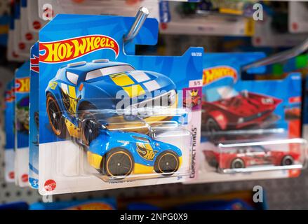 Hot Wheels Cars for sale in the Supermarket Stand. Hot Wheels is a scale die-cast toy cars by American toy maker Mattel in 1968. Stock Photo