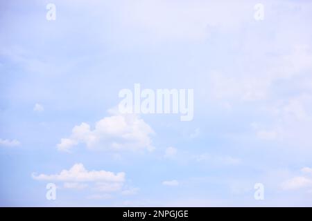 Background with bright blue sky and light clouds Stock Photo