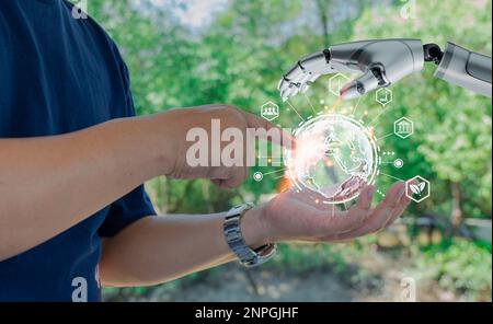 Robot and human hand with flash light with modern interface icons, Farmers analyze yields with smart technology for business growth in farm, ESG, envi Stock Photo