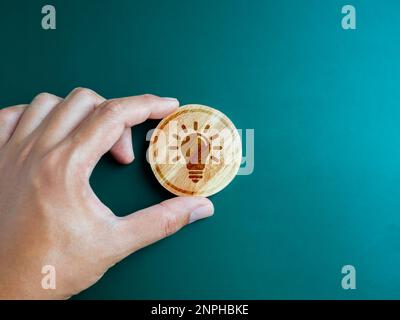 Green ecology, Inspiration and creative system management and environment development for sustainable concepts. Creative idea light bulb icon on round Stock Photo