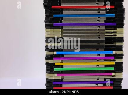 pile of floppy disks used in the 80s and 90s to record data from personal computers Stock Photo