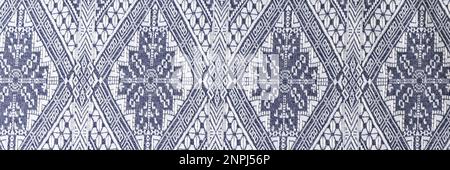 Indigo woodcut seamless ethnic geometric pattern closeup Stock Photo