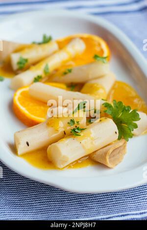 Salsify with Vegan Lunch meat and Orange Sauce Stock Photo