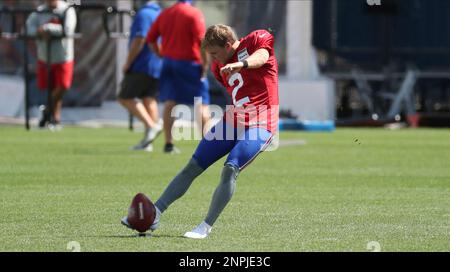 Buffalo Bills kicker Tyler Bass, right, kicks a field goal from the hold of  punter Sam Martin during the first half an NFL preseason football game  against the Indianapolis Colts in Orchard