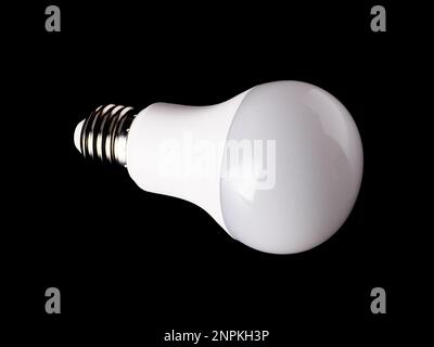 Economical LED light bulb isolated on a black background Stock Photo