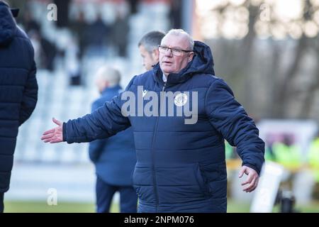 Football manager Steve Evans standing on touchline during game whilst manager of Stevenage Football Club Stock Photo