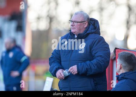 Football manager Steve Evans standing on touchline during game whilst manager of Stevenage Football Club Stock Photo