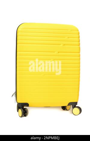 Yellow plastic suitcase isolated on white background. Stock Photo
