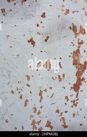 Grunge background texture. Rough concrete wall texture background. Old cracked plaster crumbles. Stock Photo