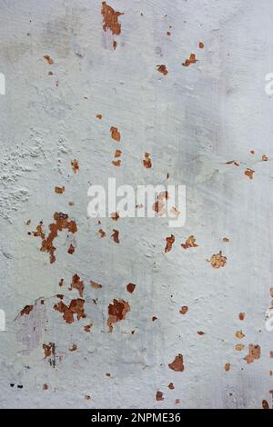 Grunge background texture. Rough concrete wall texture background. Old cracked plaster crumbles. Stock Photo