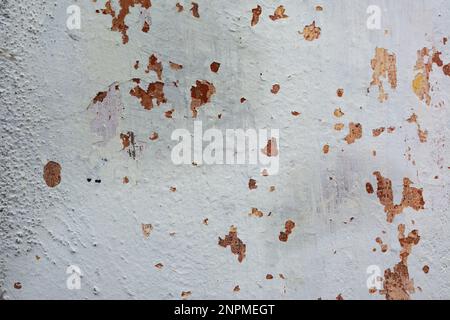 Grunge background texture. Rough concrete wall texture background. Old cracked plaster crumbles. Stock Photo