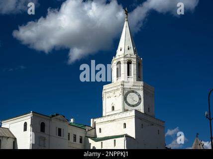 Kazan Kremlin in summer, Tatarstan, Russia. Scenery of white Spasskaya Tower on blue sky background. Kremlin is main landmark of Kazan. Historical arc Stock Photo